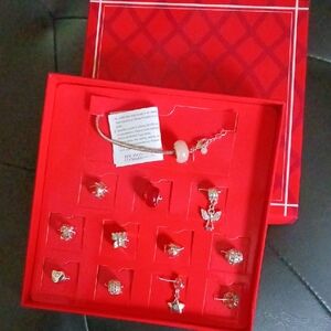 Avon Silver and Red Charm Bracelet